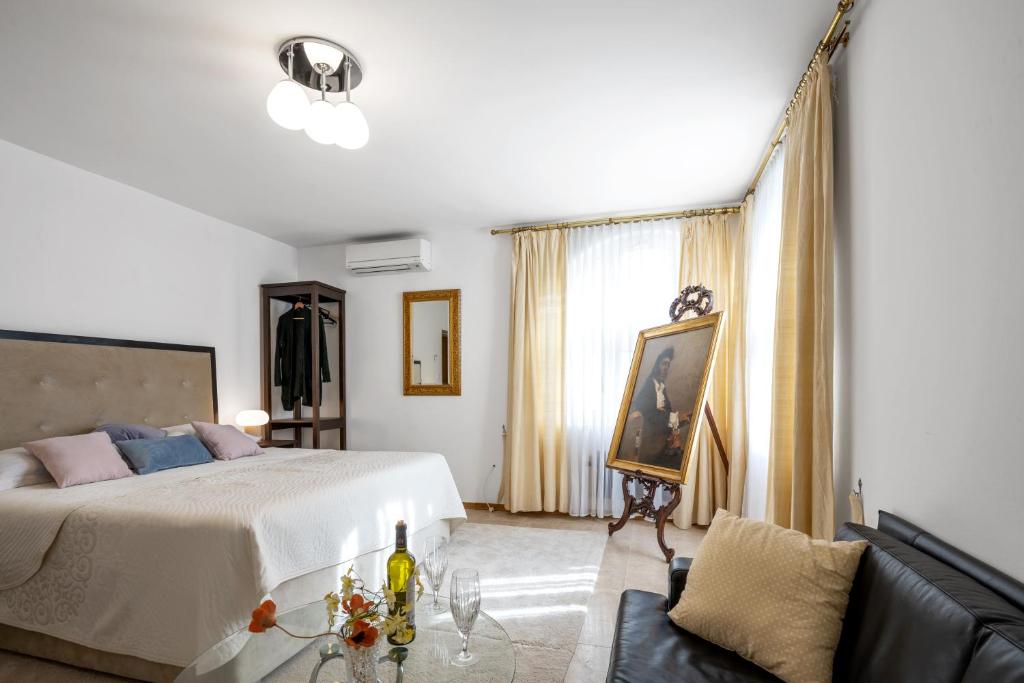 Posteľ alebo postele v izbe v ubytovaní Apartment Sinjorina Leticia