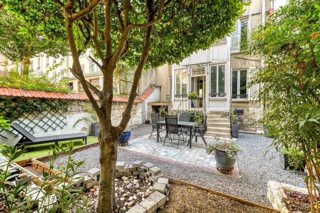 Zdjęcie z galerii obiektu Maison 60m² avec jardin de 90m² au centre de Paris w Paryżu