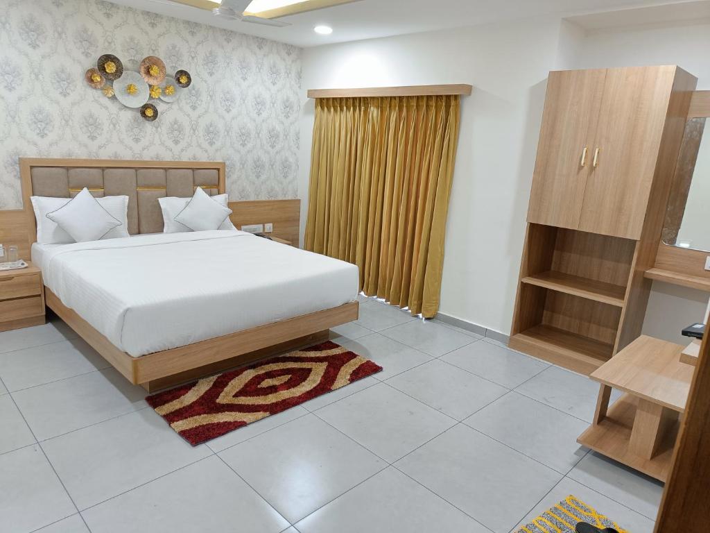 Postel nebo postele na pokoji v ubytování Hotel Lotus