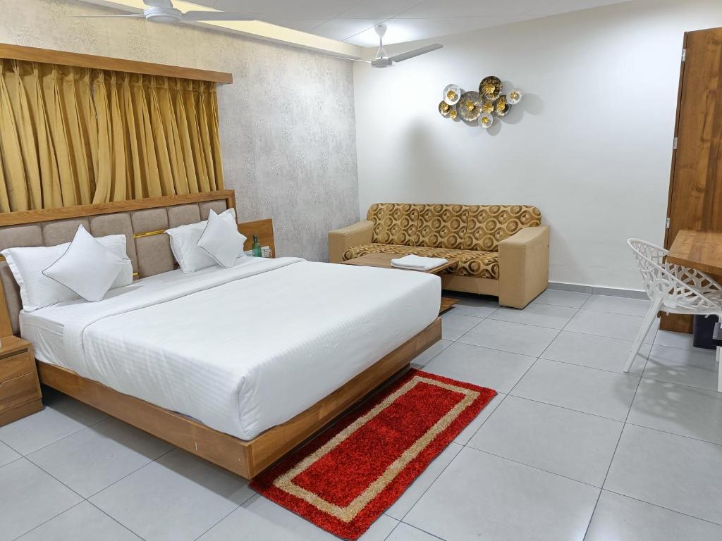 Postel nebo postele na pokoji v ubytování Hotel Lotus
