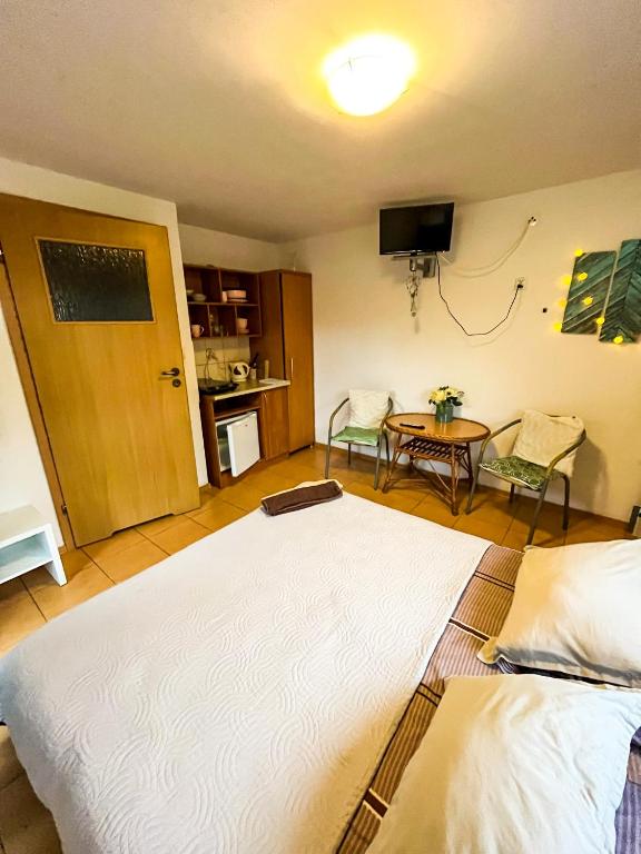 Postel nebo postele na pokoji v ubytování Pokoje Gościnne Emilio