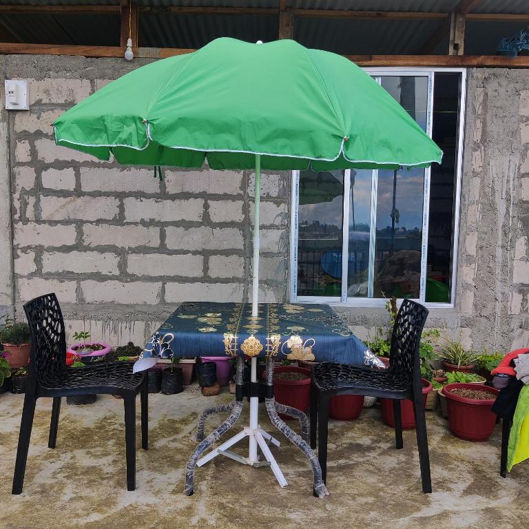 Patio nebo venkovní prostory v ubytování The Silver Spring Homestay