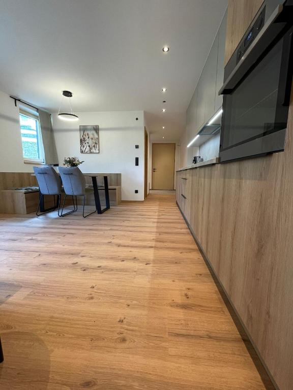 Kuchyň nebo kuchyňský kout v ubytování Apartment Aliprandi