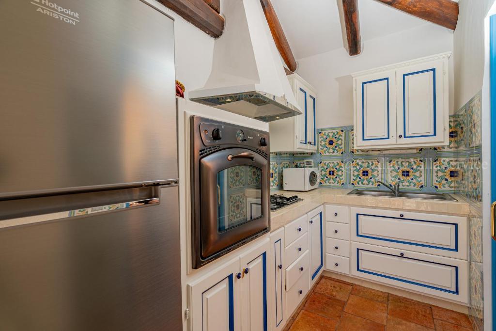 Kuchyňa alebo kuchynka v ubytovaní Villa Corallina - Porto Cervo