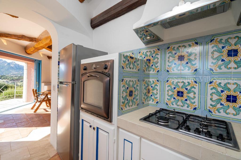 Kuchyňa alebo kuchynka v ubytovaní Villa Corallina - Porto Cervo