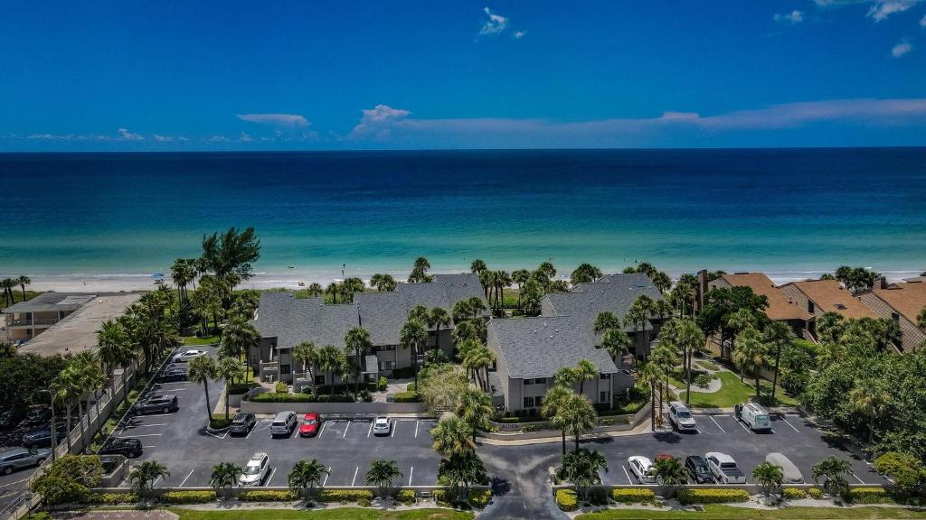 an aerial view of a resort with the beach at Beachfront Aldea 5 in Clearwater Beach