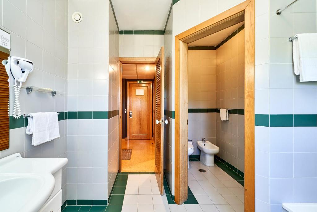 Koupelna v ubytování Hotel Castrum Villae by Walk Hotels