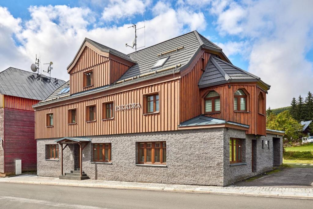 a wooden house on top of a building at Apartment Eskadra in Horní Malá Úpa