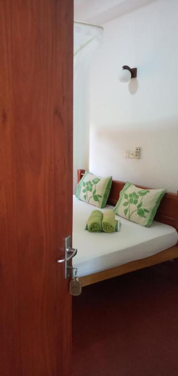 Postel nebo postele na pokoji v ubytování Pravindi Guest Home
