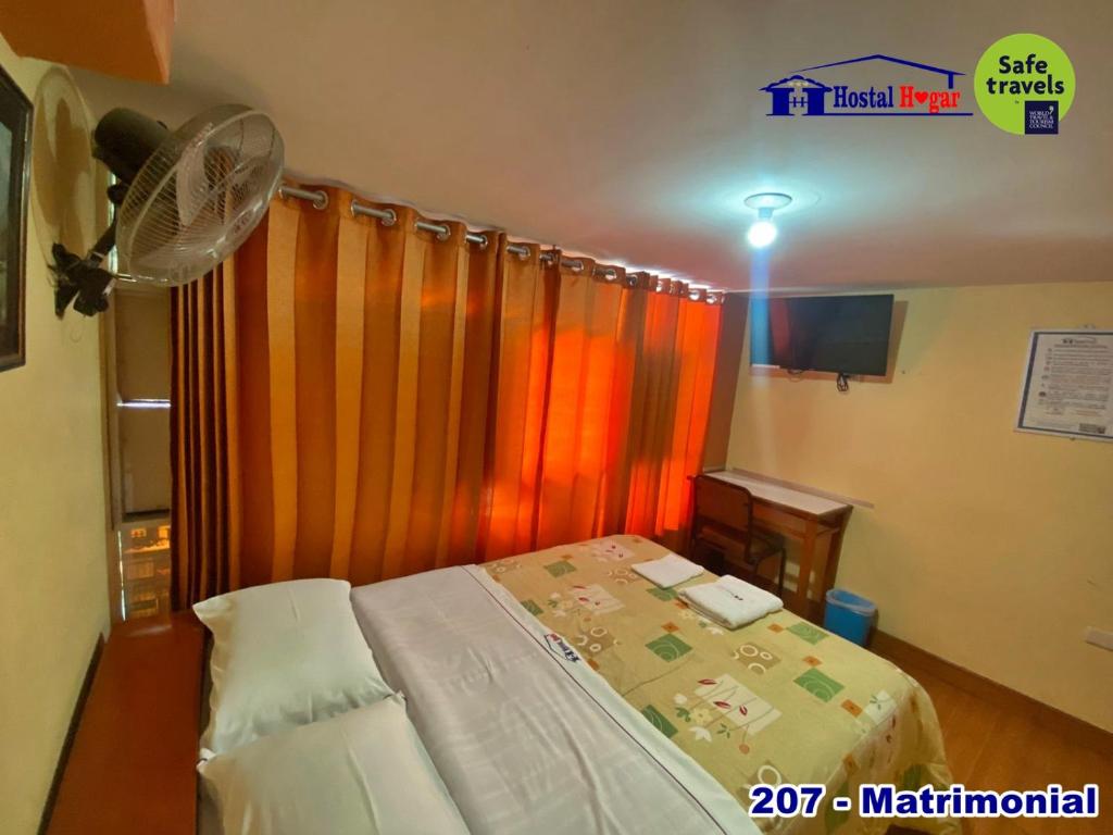 Postel nebo postele na pokoji v ubytování HOSTAL HOGAR 3 Estrellas - CHEPÉN