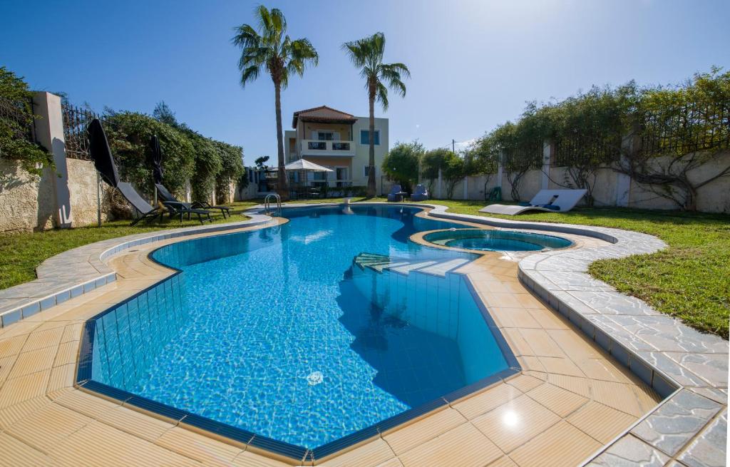 Bazén v ubytovaní Villa Ifigeneia Private Hot Tub Rooms alebo v jeho blízkosti
