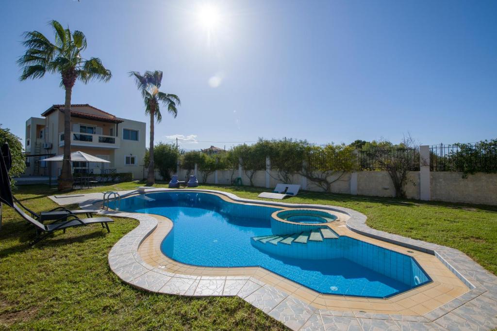 Bazén v ubytovaní Villa Ifigeneia Private Hot Tub Rooms alebo v jeho blízkosti
