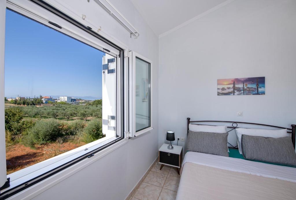 Posteľ alebo postele v izbe v ubytovaní Villa Ifigeneia Private Hot Tub Rooms
