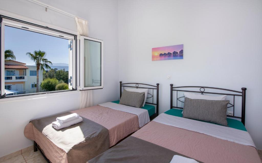 Posteľ alebo postele v izbe v ubytovaní Villa Ifigeneia Private Hot Tub Rooms