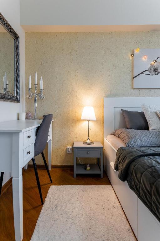 Posteľ alebo postele v izbe v ubytovaní Old Town Vintage Apartment Sturova