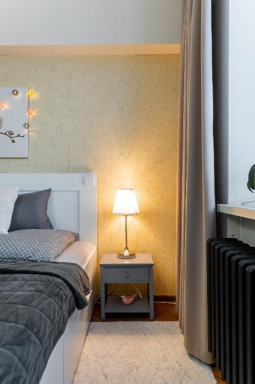 Posteľ alebo postele v izbe v ubytovaní Old Town Vintage Apartment Sturova