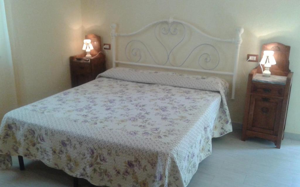 Postel nebo postele na pokoji v ubytování Hotel Gli Acquerelli