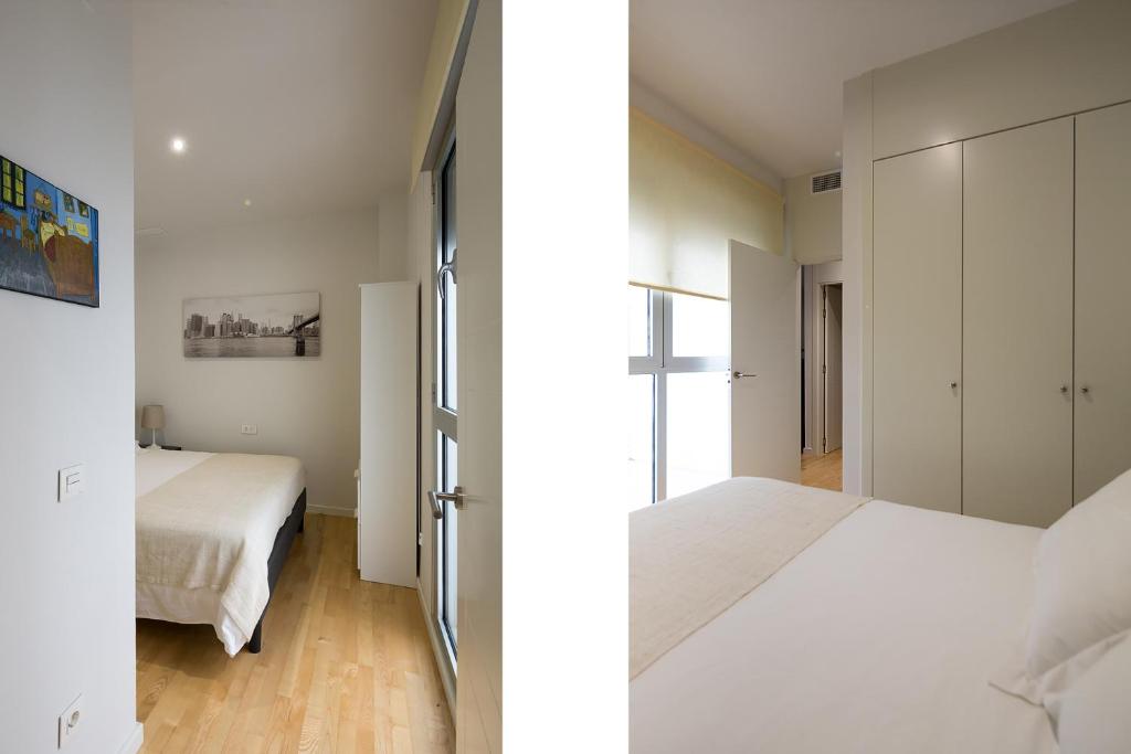 Łóżko lub łóżka w pokoju w obiekcie Veoapartment Rastro
