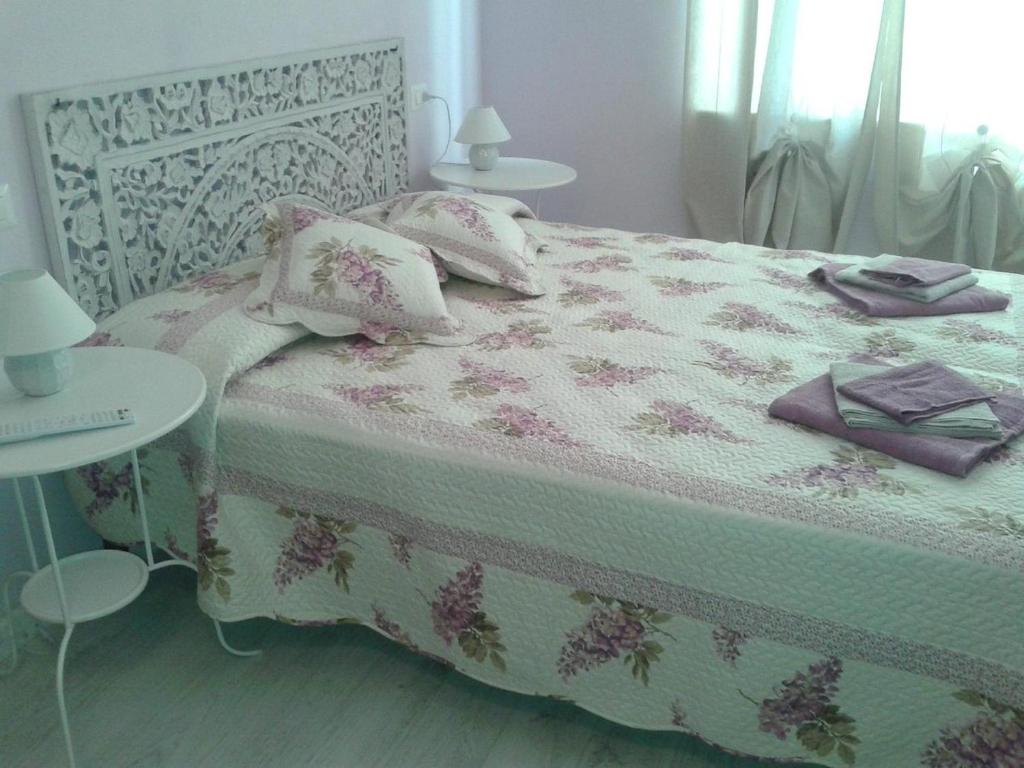 Postel nebo postele na pokoji v ubytování Hotel Gli Acquerelli