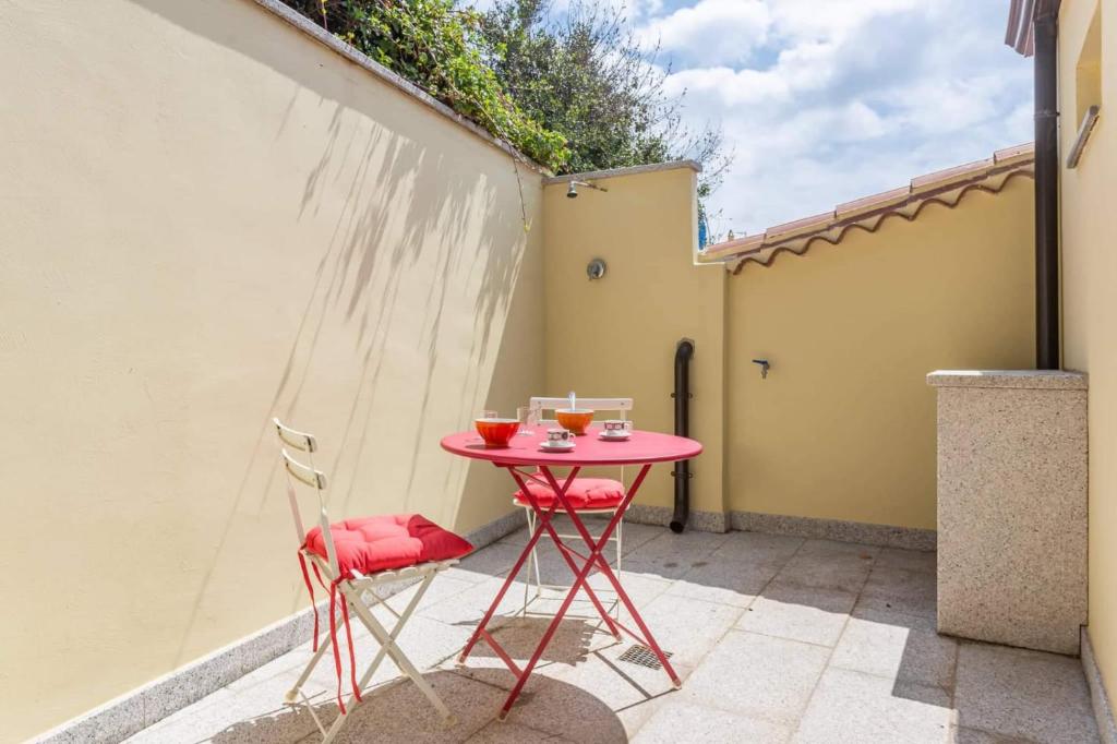 Patio lub wspólna przestrzeń na świeżym powietrzu w obiekcie RAINBOW