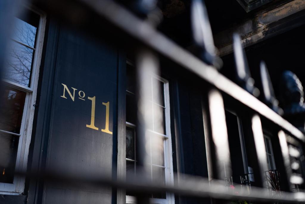 a row of windows on a building with no on it at No11 Boutique Hotel & Brasserie in Edinburgh