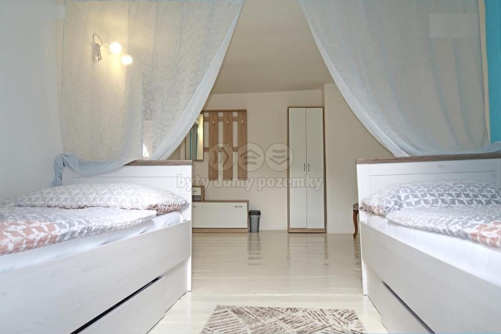 Postel nebo postele na pokoji v ubytování Guesthouse "Malena"