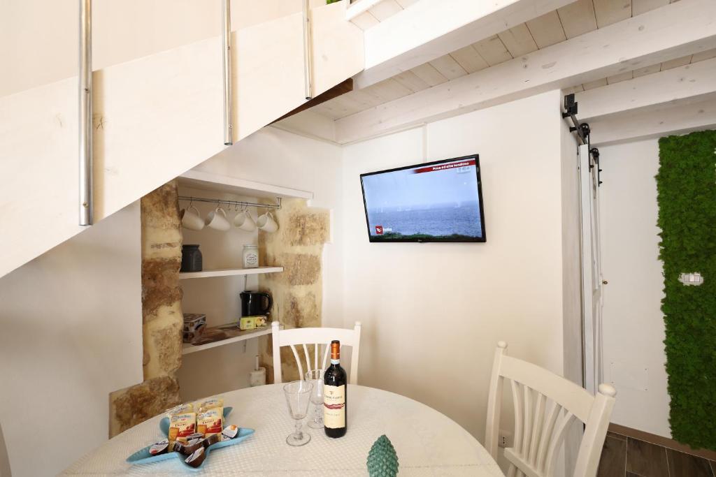 TV a/nebo společenská místnost v ubytování La Maison