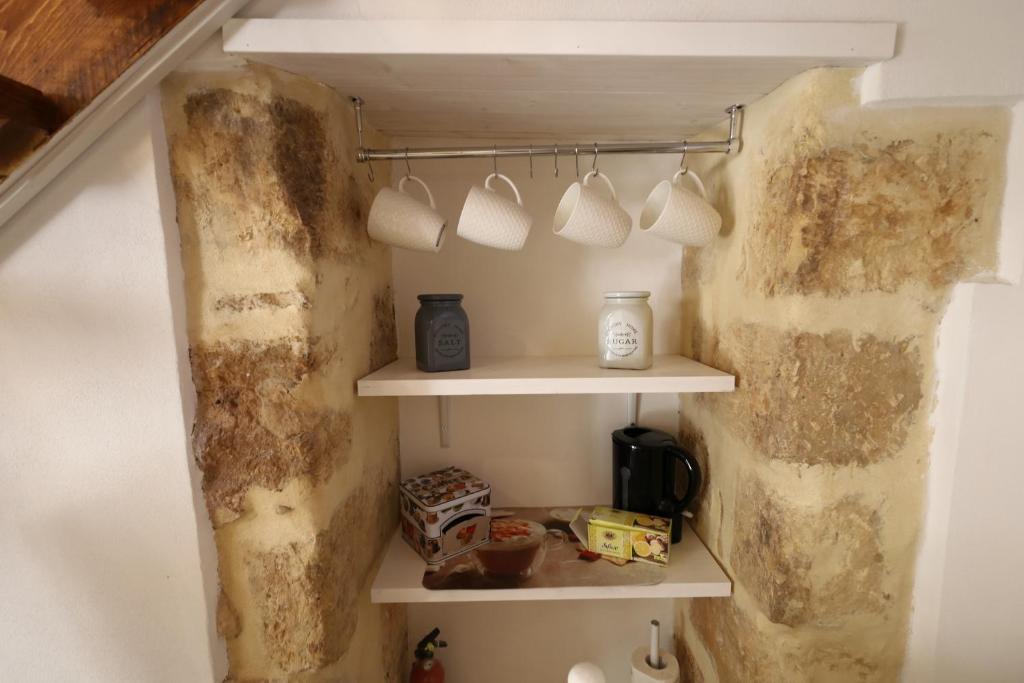 Kuchyň nebo kuchyňský kout v ubytování La Maison