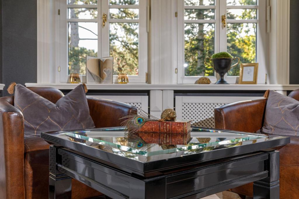 Posezení v ubytování Luxus Hotel Design Villa Ottilienruh Ilsenburg im Harz