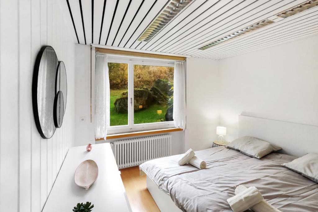Postel nebo postele na pokoji v ubytování Appartement confortable avec un sauna