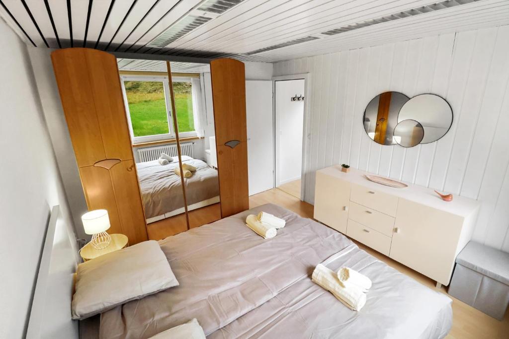 Postel nebo postele na pokoji v ubytování Appartement confortable avec un sauna
