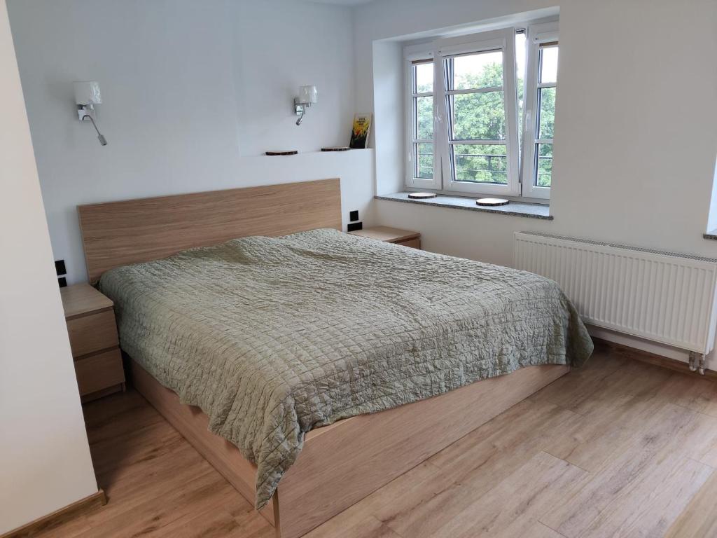 Posteľ alebo postele v izbe v ubytovaní Apartament De Lux LIDIA