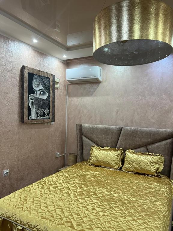 Postel nebo postele na pokoji v ubytování Studio apartman De Lux Loznica