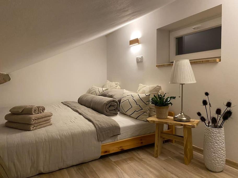 Postel nebo postele na pokoji v ubytování Garden House