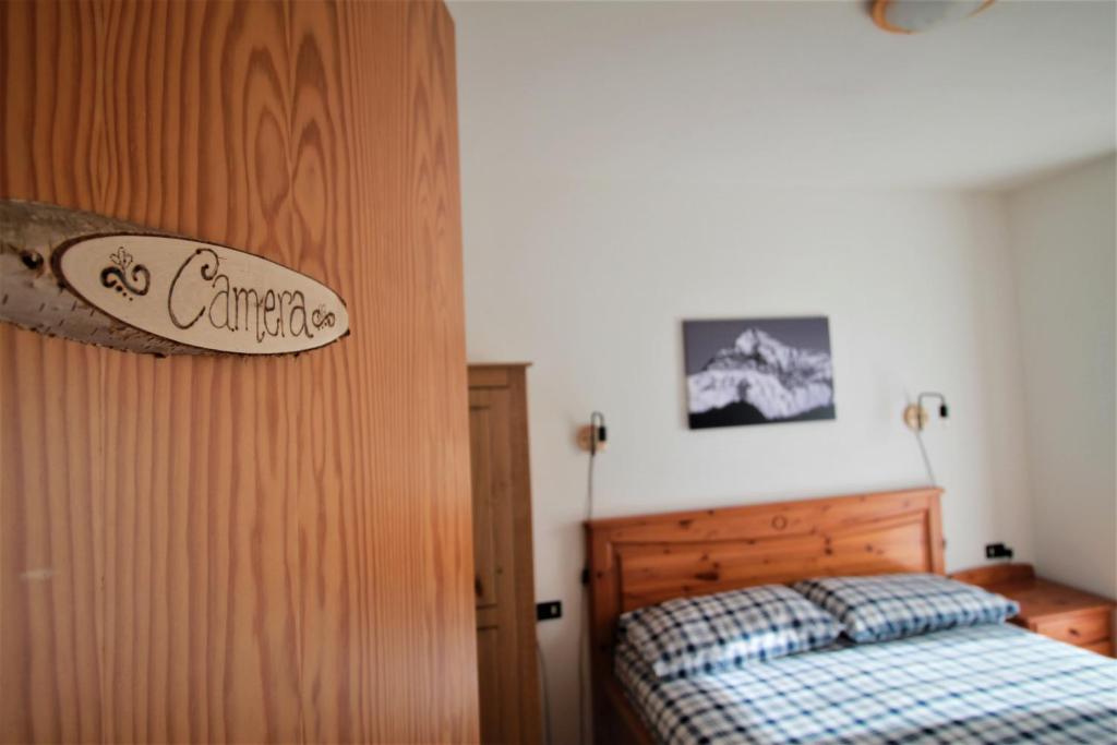Postel nebo postele na pokoji v ubytování Cà Pizzo Scalino