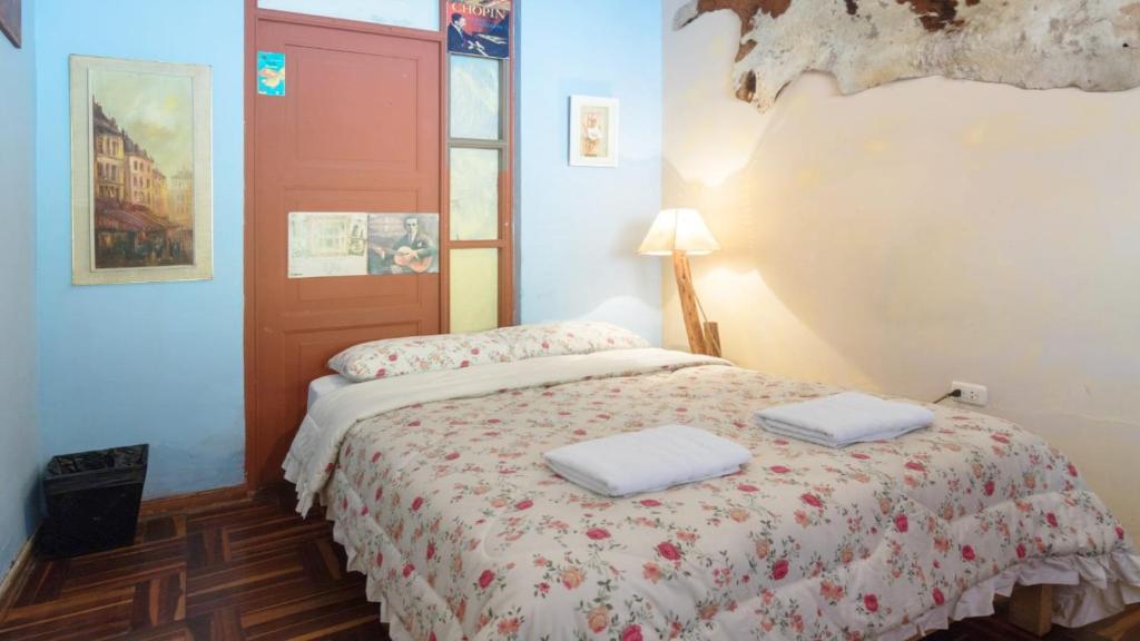 Postel nebo postele na pokoji v ubytování Beraja Family Hostel