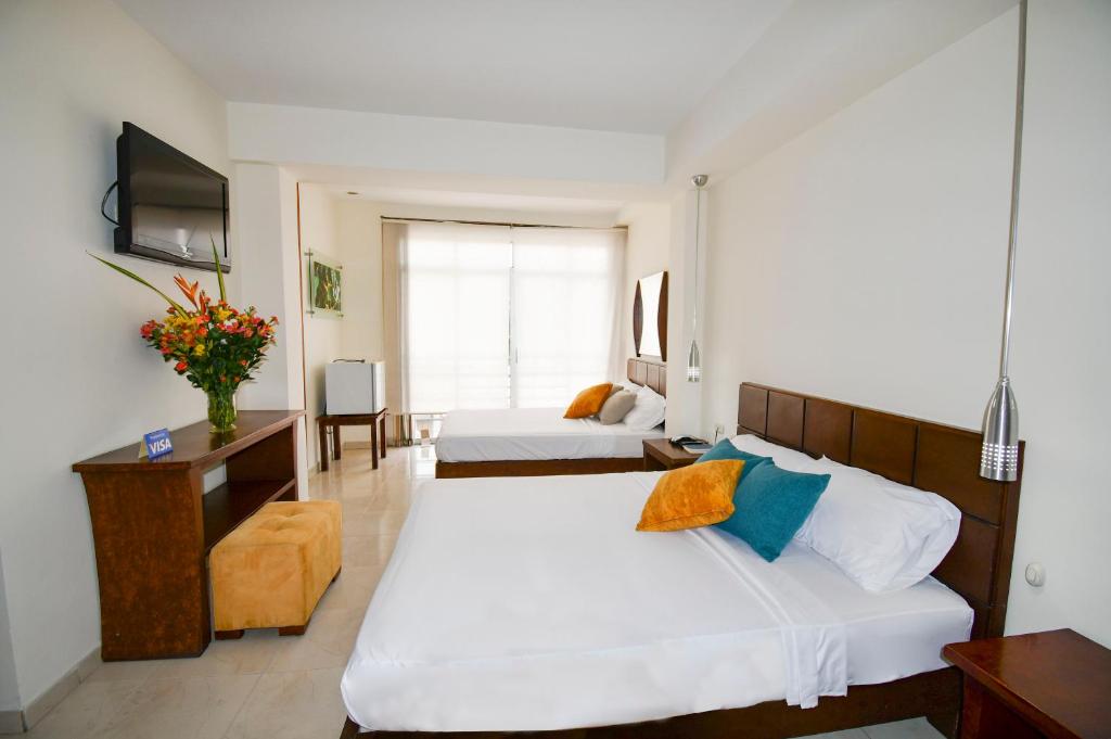 Hotel Monarca Armenia - Habitación Cuádruple De Confort