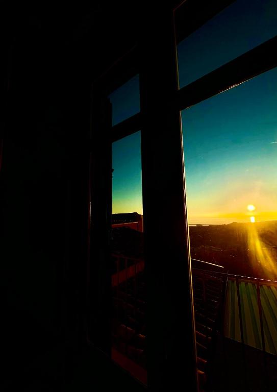 The sunrise or sunset as seen from a vendégházakat or nearby