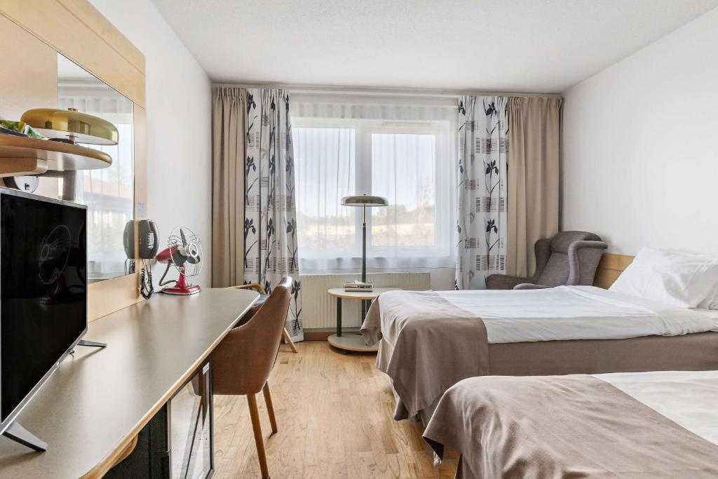 Postel nebo postele na pokoji v ubytování Best Western Hotel Norra Vattern