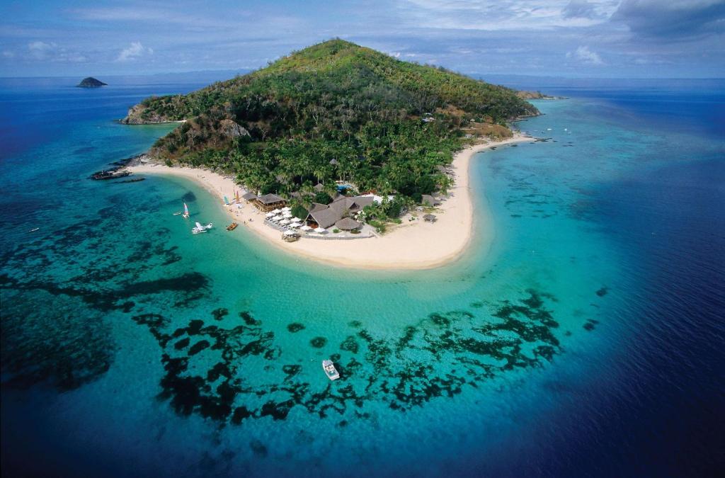 une île au milieu de l'océan dans l'établissement Castaway Island, Fiji, à Castaway Island