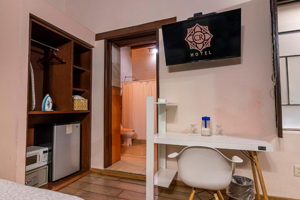TV a/nebo společenská místnost v ubytování Hotel Cantera Rosa