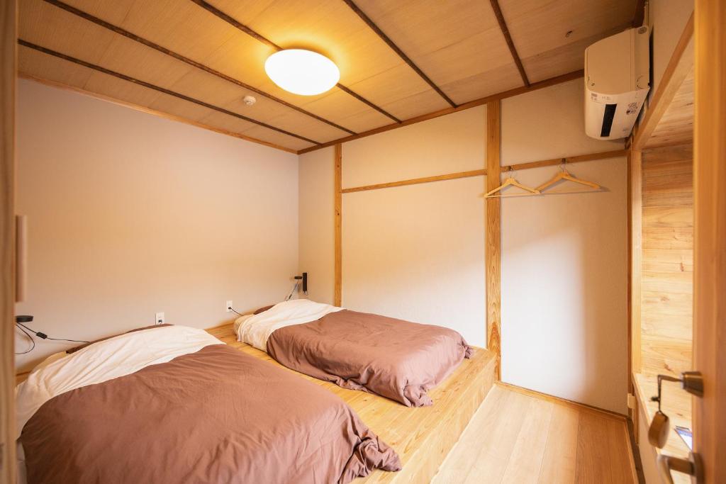 Postel nebo postele na pokoji v ubytování HOSTEL perch