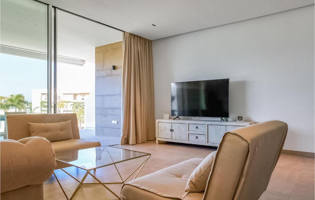 A television and/or entertainment centre at Gorgeous Apartment In Chipiona