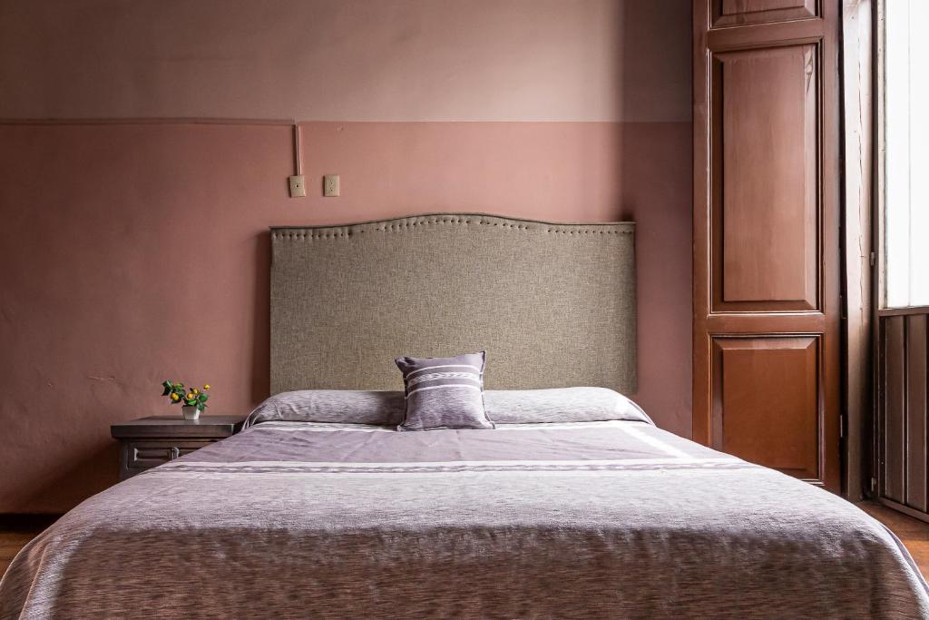 Postel nebo postele na pokoji v ubytování Hotel Cantera Rosa
