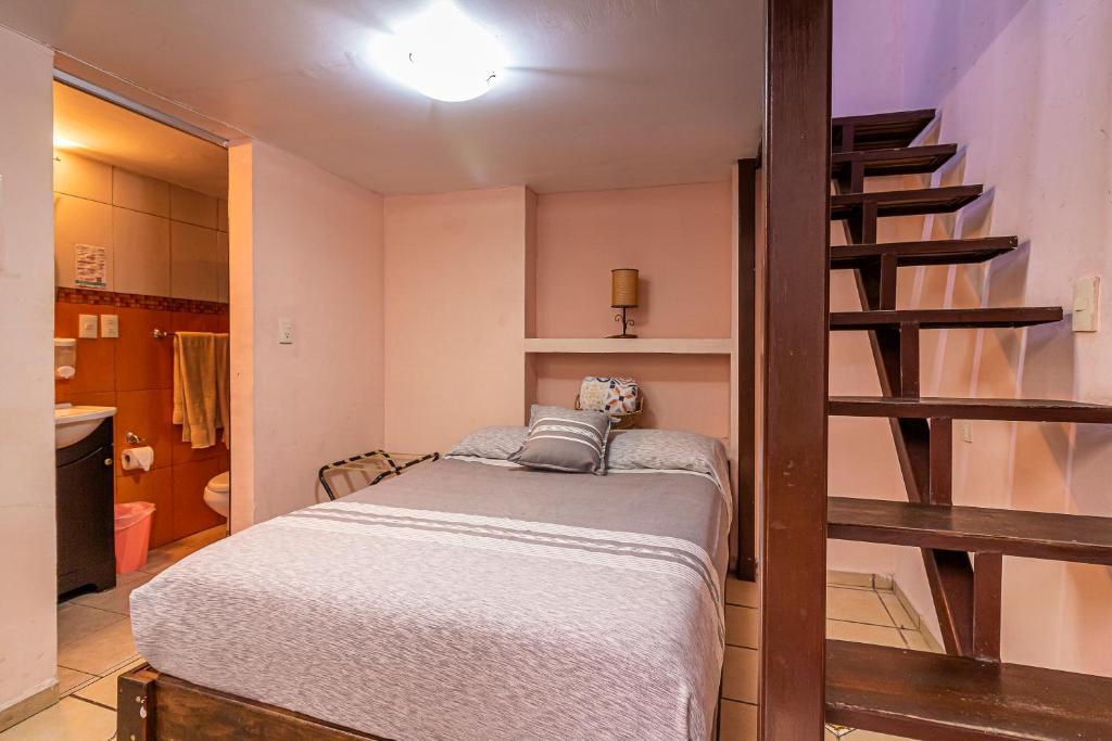Postel nebo postele na pokoji v ubytování Hotel Cantera Rosa