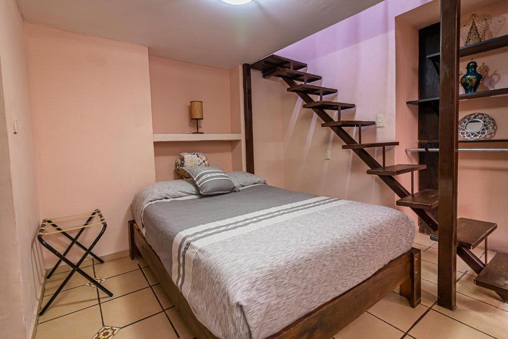 Postel nebo postele na pokoji v ubytování Hotel Cantera Rosa