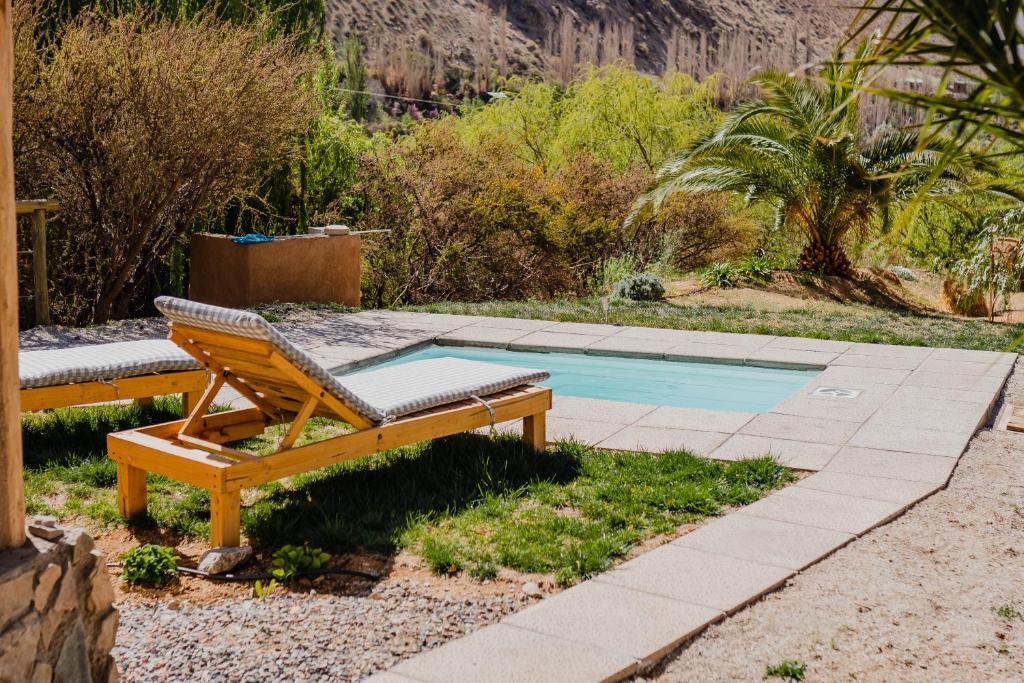 Bazén v ubytování Piuquenes Lodge - Cabañas, Viñedos y estrellas en Horcón, Valle de Elqui nebo v jeho okolí