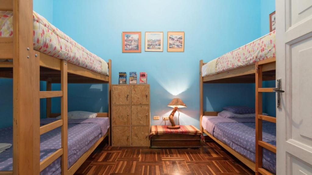 Postel nebo postele na pokoji v ubytování Beraja Family Hostel
