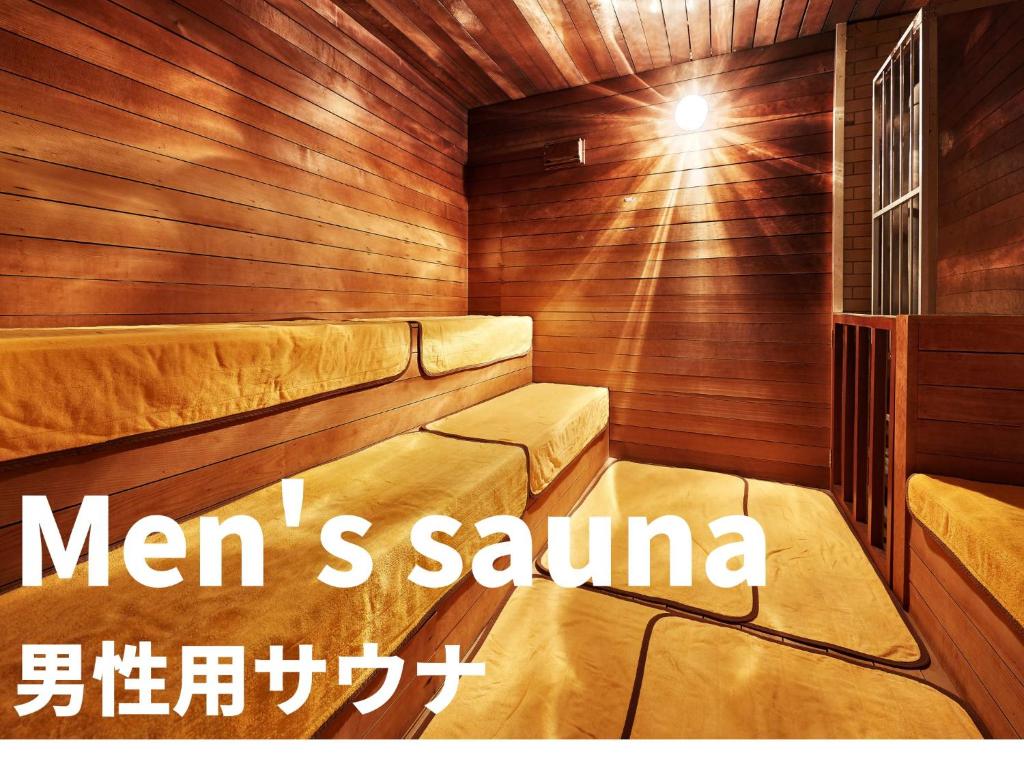 a sauna with a sign that reads mens sauna at Crown Hotel Okinawa in Okinawa City
