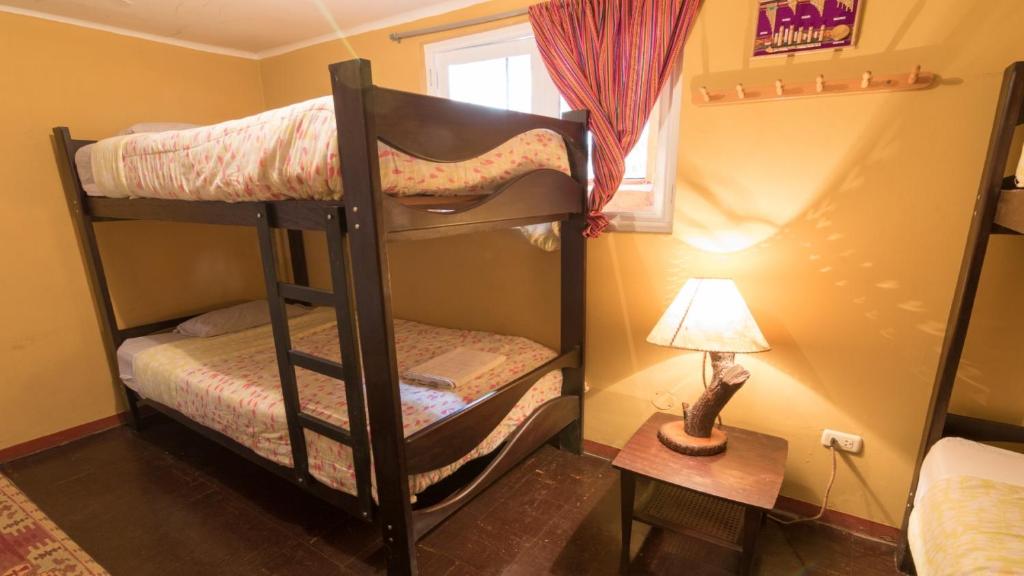 Postel nebo postele na pokoji v ubytování Beraja Family Hostel